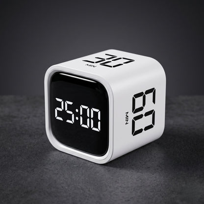 The Discipline Clock in white on a desk, 25:00 countdown on the LED display