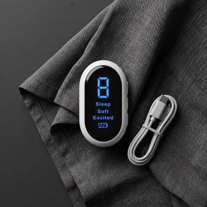 The Sleep Signal device in white with USB-C cable, display showing Sleep, Soft, and Excited modes